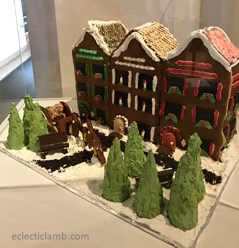 row houses gingerbread under glass at museum