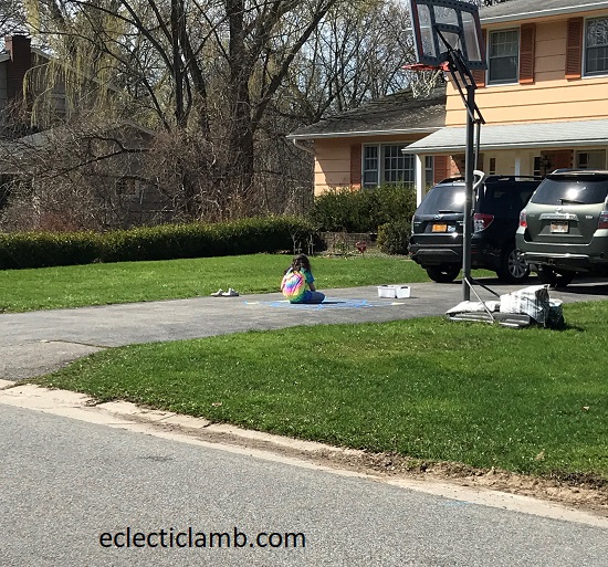 Child Drawing with Chalk