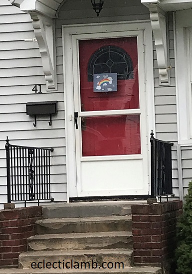 rainbow clouds on door