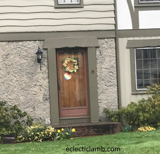 rainbow heart on wooden door